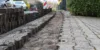 Glasfaserausbau in Alsbach-Hähnlein. Zu sehen ist eine vorbereitete Baustelle, in der Glasfaserkabel verlegt werden sollen.